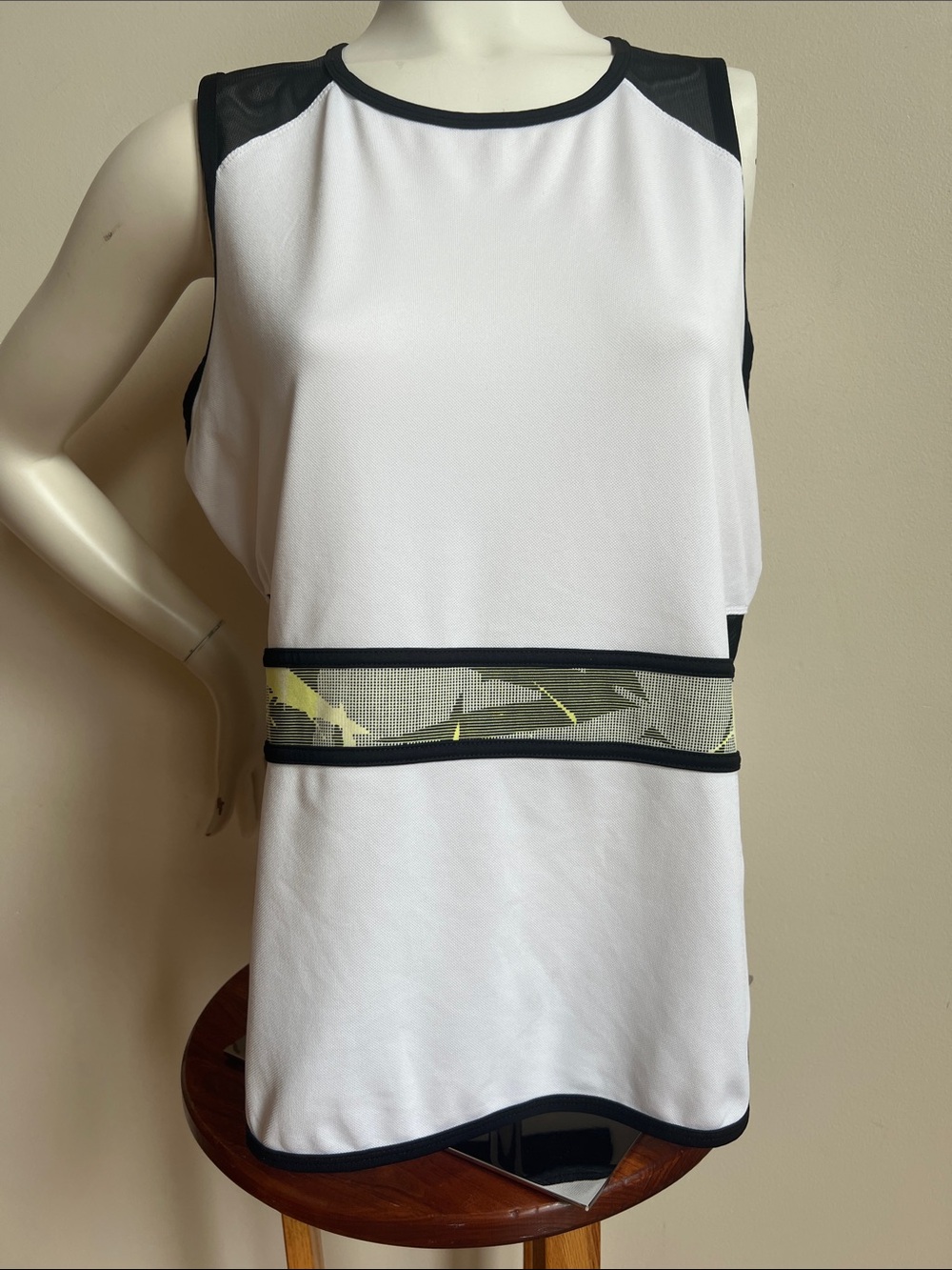 Tail Sleeveless Tank with Black Trim and Mesh side vents